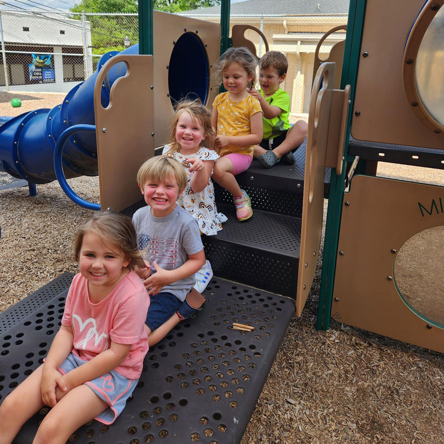 children on playground at First Baptist Church Shelby
